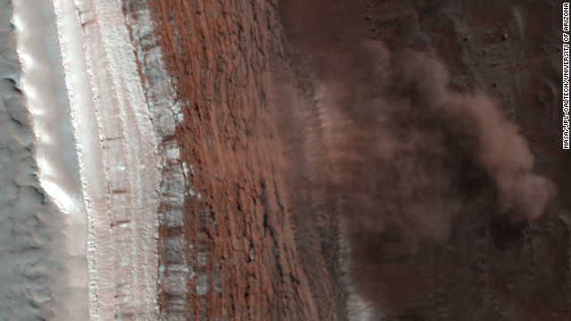 An image captured in 2008 by NASA's Mars Reconnaissance Orbiter shows at least four Martian avalanches, or debris falls, taking place. Material, likely including fine-grained ice and dust and possibly large blocks, detached from a towering cliff and cascaded to the gentler slopes below.