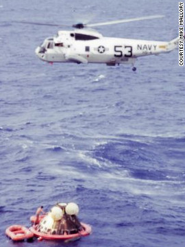 Astronaut Neil Armstrong was hoisted first into a hovering chopper, then Michael Collins, then Buzz Aldrin. Once aboard, the chopper headed for the USS Hornet. "There was real delight on those astronauts' faces, and a real thrill of accomplishment," says Wolfram.