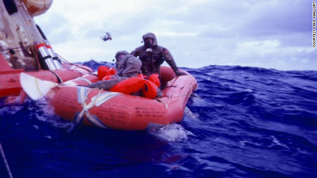 In the "decontamination raft" mission leader Clancy Hatleberg sprayed the astronauts with sodium hypochlorite and helped them scrub their suits. 