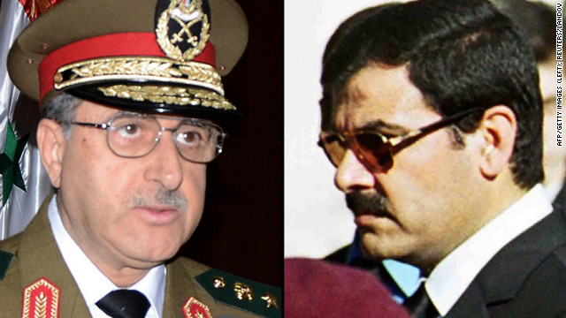 Syrian Defense Minister Dawood Rajiha, left, and Assef Shawkat, right, the brother-in-law of President Bashar al-Assad.