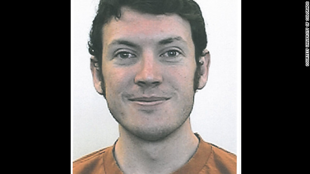 The shooter was identified by two federal law enforcement officers as James Holmes, 24, of Aurora.