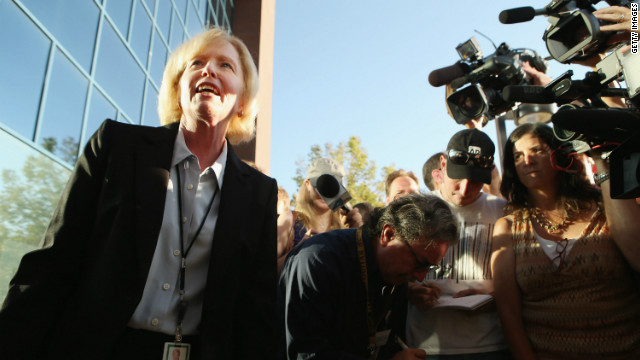 Arapahoe County District Attorney Carol Chambers talks to reporters Monday before heading into the courthouse. Chambers said the decision on whether to pursue the death penalty is a long process that involves input from victims and their families.
