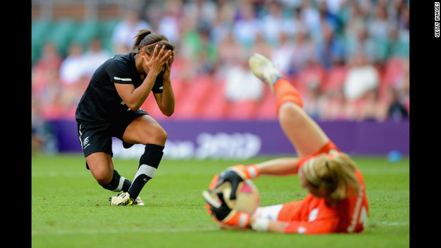 Sarah Gregorius of New Zealand reacts after Karen Bardsley of Great Britain saves the ball, barring her from scoring a goal.