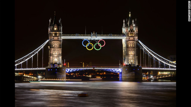 Tower Bridge, adorned with the Olympic rings, is seen late Wednesday, two days before the official start of the London 2012 Olympic Games.