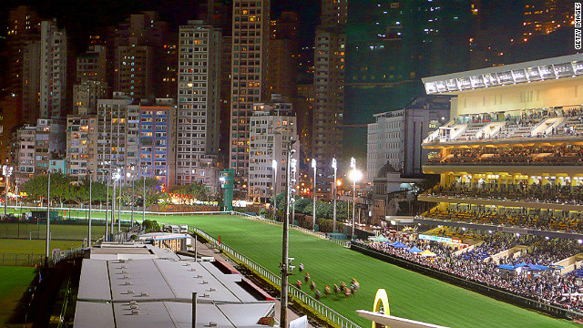 Happy Valley Racecourse was originally constructed in 1845 to provide horseracing to Britons living in Hong Kong. Due to the island's hilly terrain the only suitable area was on Happy Valley's swampland, and the government prohibited local farmers from growing rice in the immediate vicinity to allow the course to be built. Modern day Hong Kong is now a populous metropolis, providing a unique backdrop to one of Asia's greatest racecourses.