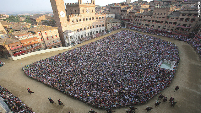 Simply put, there is no racecourse in the world quite like the Piazza del Campo in Italy. With origins dating back to medieval times, when public games were hosted in Siena's central piazza, the first racing events held were originally on buffalo. The first horse race took place in 1656. Since then the surroundings have barely changed, with the course lined with spectators on all four sides and in the central part of the piazza as the race takes place on the ring formed around it. Traditional sandstone buildings form the course's stands, and rural Tuscany forms the backdrop.