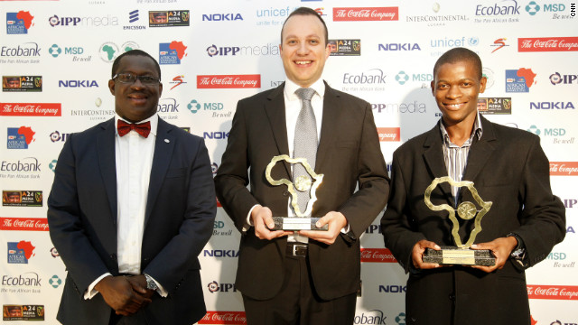 Adriaan Basson (center) and Piet Rampedi (right) are jointly-awarded the Print General News Award for their series on Julius Malema.