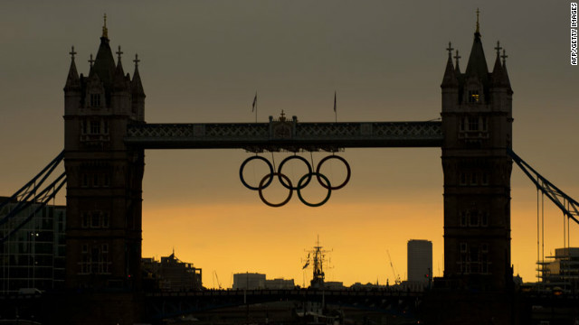 The sun sets behind the Tower Bridge in London hours before the opening ceremony of the 2012 Olympic Games on Friday.