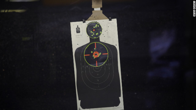 A target sheet hangs at a shooting range in Aurora, Colorado, where the recent mass shootings occurred in a movie theater.