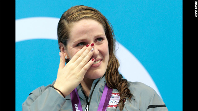 Missy Franklin of the United States wipes a tear from her face as she reacts during the medal ceremony for the women's 100-meter backstroke on Monday.