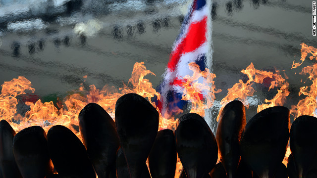 The Olympic flame burns in the cauldron at Olympic Stadium on Tuesday, the fourth day of the Games.