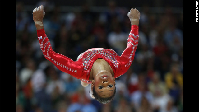 U.S. gymnast Gabrielle Douglas performs on the beam during the women's team final of the gymnastics event.