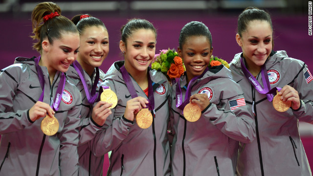 From left, gold medalist U.S. team McKayla Maroney, Kyla Ross, Alexandra Raisman, Gabrielle Douglas and Jordyn Wieber celebrate their gold medal in the women's gymnastics team final on Tuesday. They won the United States' seventh gold medal.