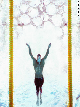 Setting another world record (1.52.49) USA's Michael Phelps wins the men's 200-meter butterfly final at the Beijing 2008 Olympic Games.