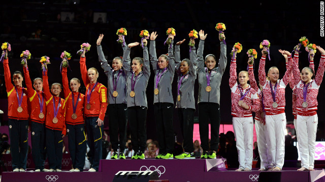 Gold winners Team USA, center,