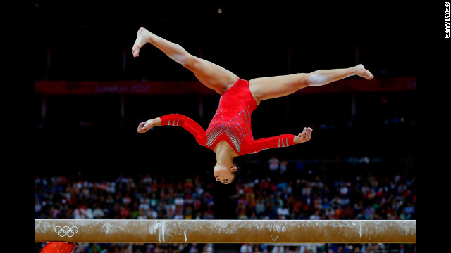 Alexandra Raisman of the United States competes on the balance beam in the gymnastics women's team final.
