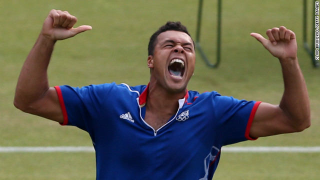 Jo-Wilfried Tsonga shouts for joy as he finds the shot that seals victory in the longest Olympic tennis match. The match lasted just under four hours and the final set ended 25-23 to the fifth-seeded Frenchman.