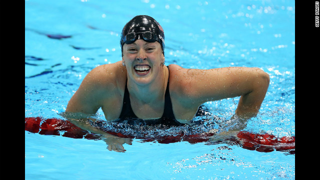 Allison Schmitt celebrates in the water after winning the gold.