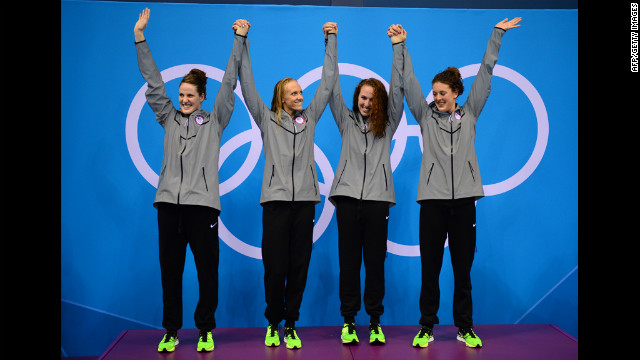Missy Franklin, Dana Vollmer, Shannon Vreeland and Allison Schmitt celebrate on the podium after taking the gold in the women's 4x200-meter freestyle relay on Wedesnday. It was the United States' eighth gold in swimming.