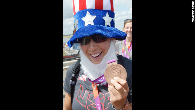 A member of the U.S. team wears an Uncle Sam getup after she and her teammates won the gold medal in the women's eight rowing final.