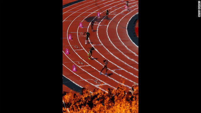 Athletes compete in the women's 400-meter heats at Olympic Stadium.