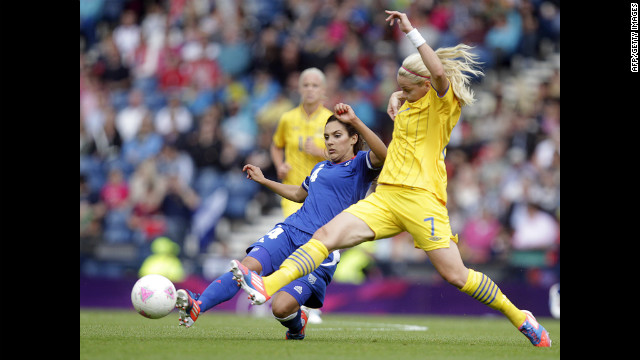 Sweden's Lisa Dahlkvist, right, vies with France's Louisa Necib during a women's football match at Hampden Park in Glasgow, Scotland.