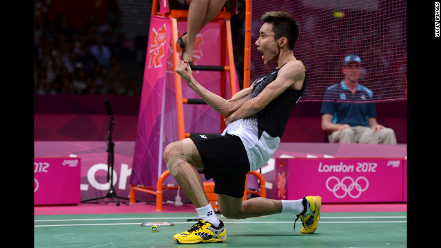 Malaysia's Chong Wei Lee celebrates winning the men's singles badminton semifinal against Long Chen of China.