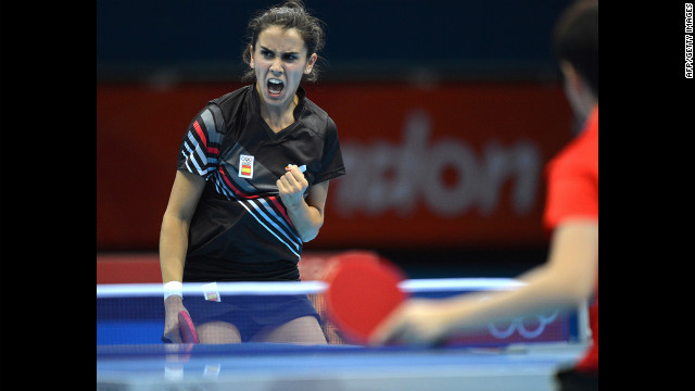 Sara Ramirez of Spain gets a point against China's Guo Yue during a table-tennis match.