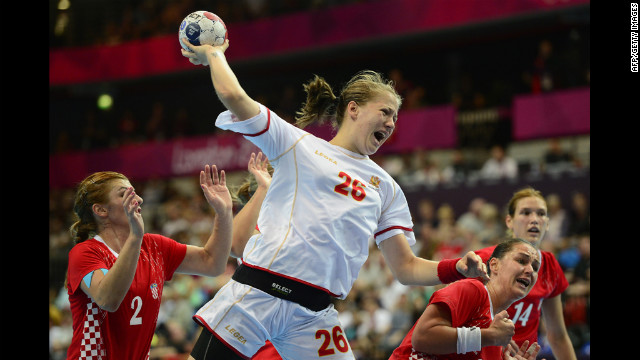 Montenegro pivot Suzana Lazovic jumps to shoot during a women's preliminary handball match against Croatia.