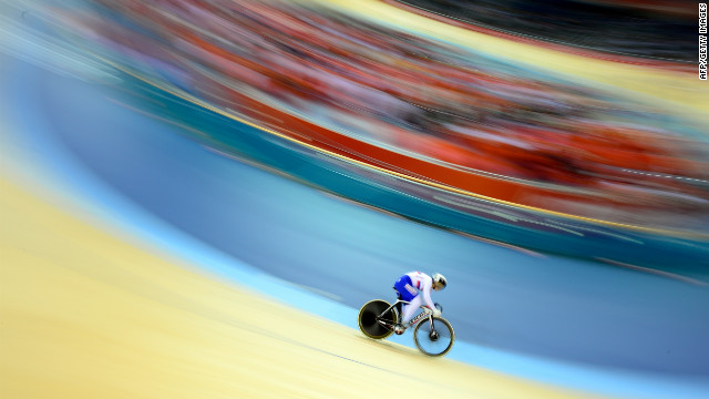 Russia's Ekaterina Gnidenko warms up before the women's cycling-track keirin event.