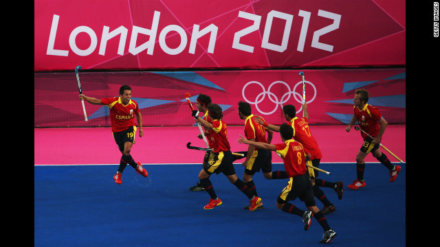 Marc Salles of Spain celebrates after scoring a goal during the men's hockey match against South Africa.