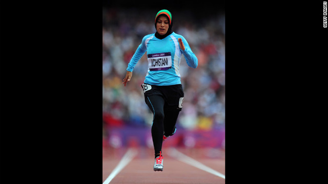 Tahmina Kohistani of Afghanistan competes in the women's 100-meter heat.