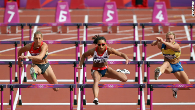 From left, Jennifer Oeser of Germany, Louise Hazel of Great Britain and Jessica Samuelsson of Sweden compete in the women's heptathlon 100-meter hurdles heat.