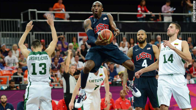 The United States' Kobe Bryant jumps with the ball during a men's preliminary round group A basketball match against Lithuania.