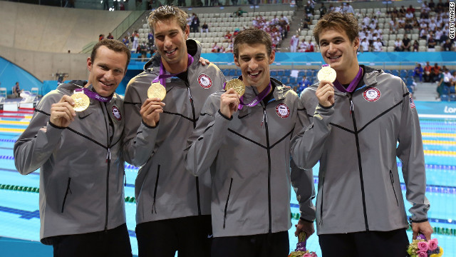 Left to right: Brendan Hansen, Matthew Grevers, Michael Phelps and Nathan Adrian pose following the medal ceremony for the men's 4x100-meter medley on Saturday, August 4.