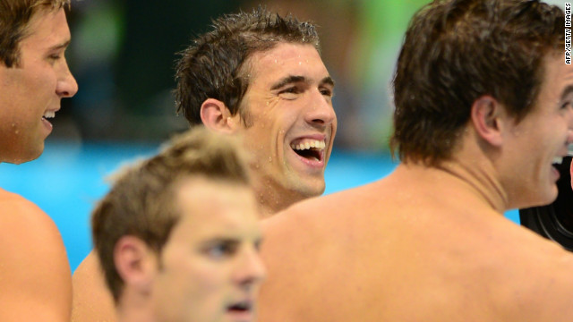 Golden boy. Michael Phelps takes center stage for one last time with his medley relay teammates. 