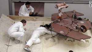 Scott Maxwell, top, Kim Lichtenberg, left, and Pauline Hwang test how to get Spirit out of a Martian \