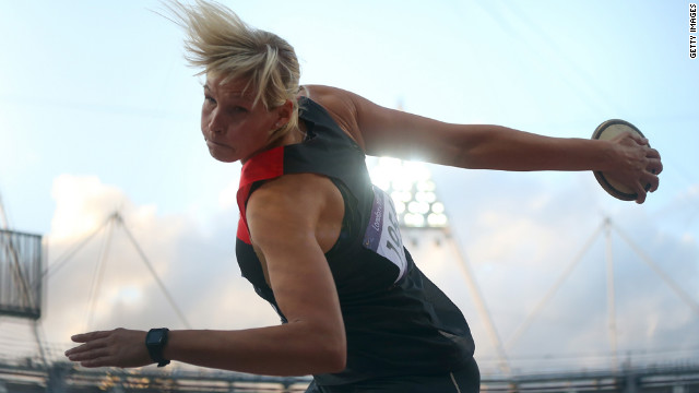 Nadine Muller of Germany competes in the final of the women's discus throw.