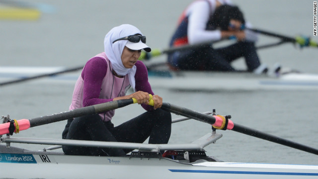Iran's Soulmaz Abbasiazad rests after competing in the women's single sculls final of the rowing event Saturday.