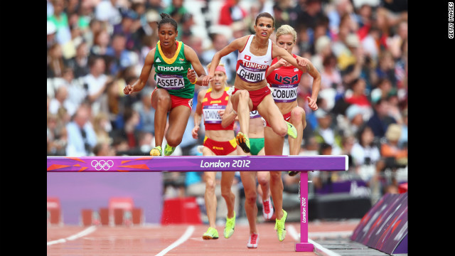 Sofia Assefa of Ethiopia, left, Habiba Ghribi of Tunisia and Emma Coburn of the United States compete in the women's 3,000-meter steeplechase.