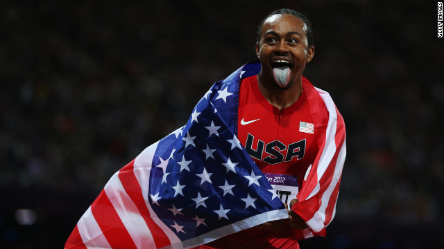 Aries Merritt of the United States celebrates after winning gold in the men's 110-meter hurdles final.