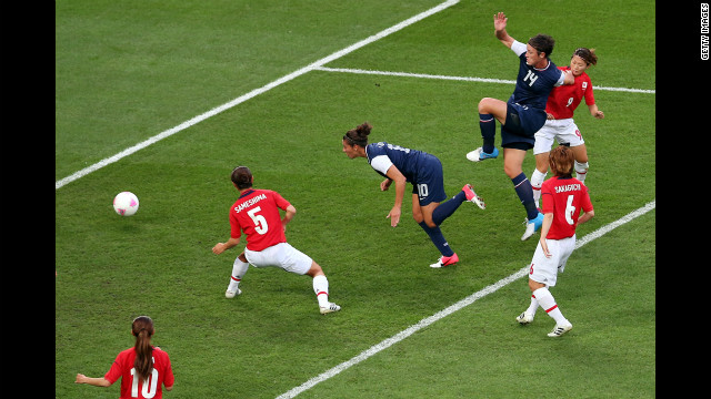 Carli Lloyd of the United States heads in a goal in the first half of the game against Japan. The U.S. women's soccer team took its third straight Olympic gold medal.