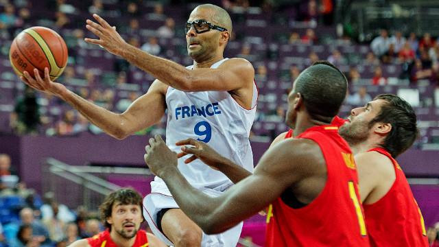 France's NBA star Tony Parker was powerless to stop Spain's march into the semifinal of the men's basketball -- the final score 66-59.