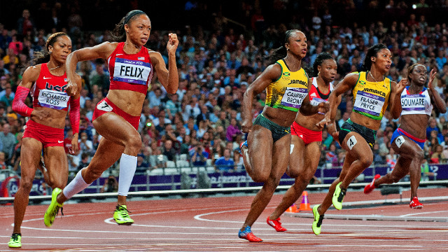 Allyson Felix defeats a truly world-class field to take women's 200m gold. Shelly-Ann Fraser-Pryce of Jamaica, the 100m champion, was a close second with American Carmelita Jeter third.