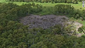   Sinkholes on Louisiana Probes Cause Of Massive Bayou Sinkhole   Cnn Com