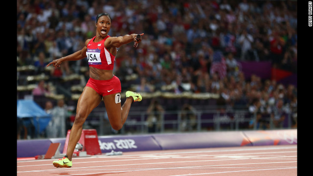 Carmelita Jeter of the United States celebrates winning gold in the women's 4x100-meter relay.