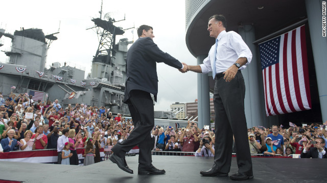 Romney and Ryan shake hands as they embark on a four-day, four-state bus tour through Virginia, North Carolina, Florida and Ohio.