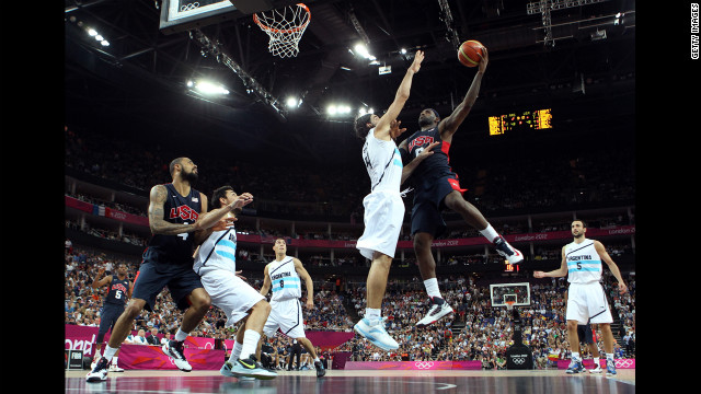 LeBron James,No.6 of United States,goes up for a shot against Luis Scola, No.4 of Argentina,during the mn's basketball semifinal match on Friday, August 10. <a href='http://www.cnn.com/2012/08/09/worldsport/gallery/olympics-day-thirteen/index.html'>Check out Day 13 of competition</a> from Thursday, August 9. The Games run through Sunday, August 12. See all the action as it unfolds here.