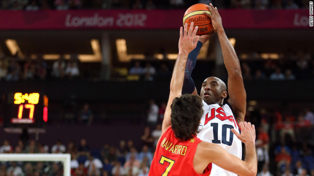 Kobe Bryant of the United States shoots a three-point shot over Juan-Carlos Navarro of Spain.