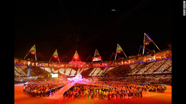 The athletes of the competing nations enter the stadium.